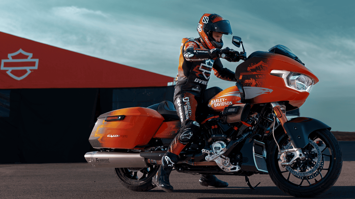 2025 Harley-Davidson® CVO™ Road Glide® RR showcased in racing gear near Friendswood, TX, combining high-performance style with track-ready engineering.