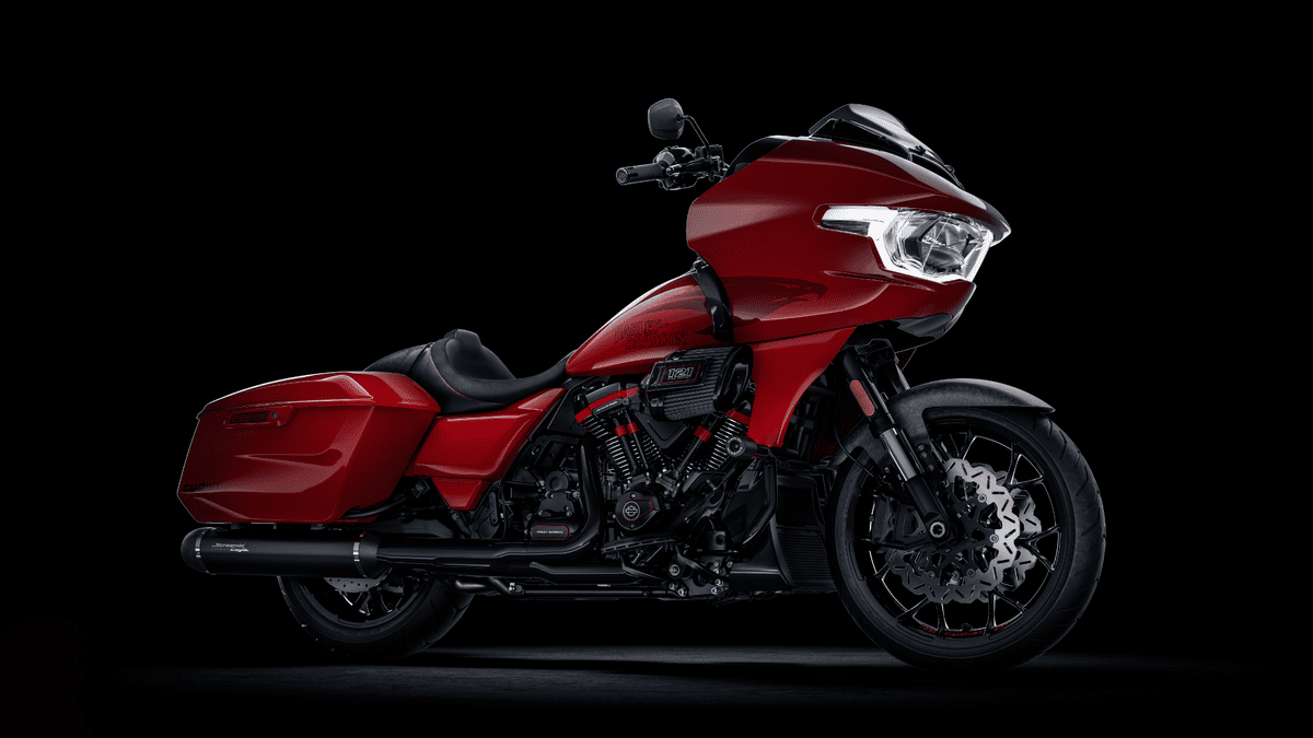 2025 Harley-Davidson® Road Glide® in black, illuminated in a studio setting, showcasing touring-ready design near Deer Park, TX.