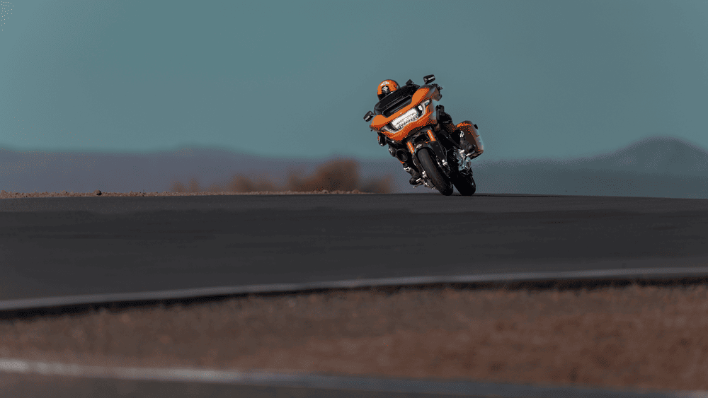 2025 Harley-Davidson® CVO™ Road Glide® RR racing down open track near Friendswood, TX, built for riders who crave aggressive street and track performance.